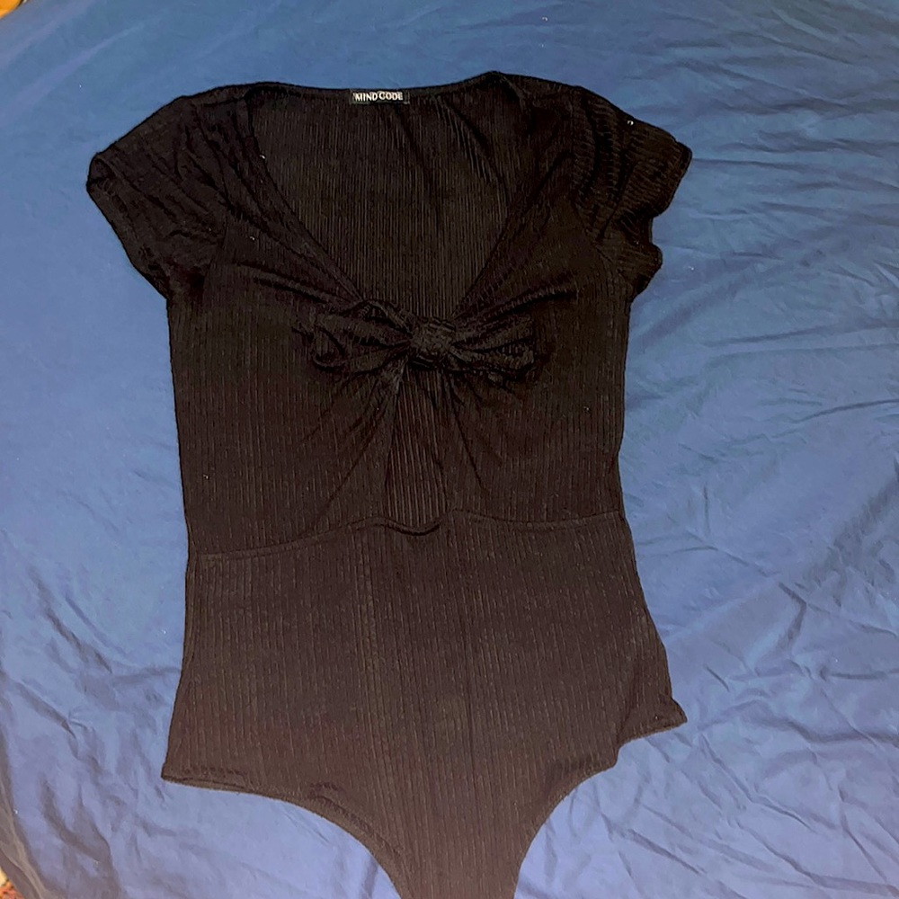 Black bodysuit with cleavage